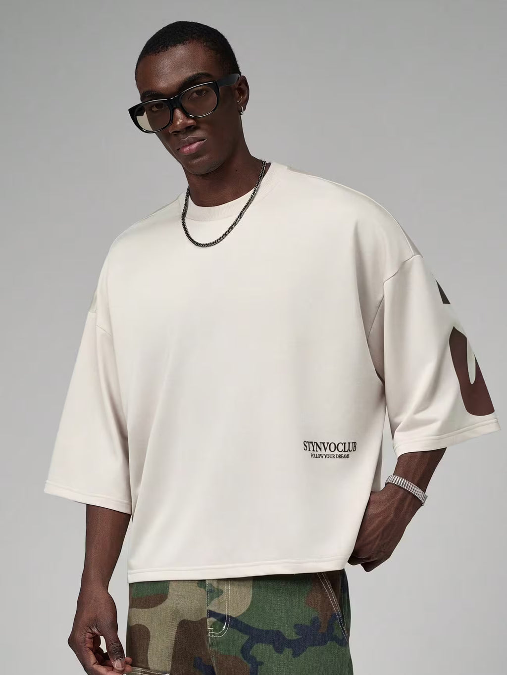 Loose-fitting knit t-shirt with patchwork print