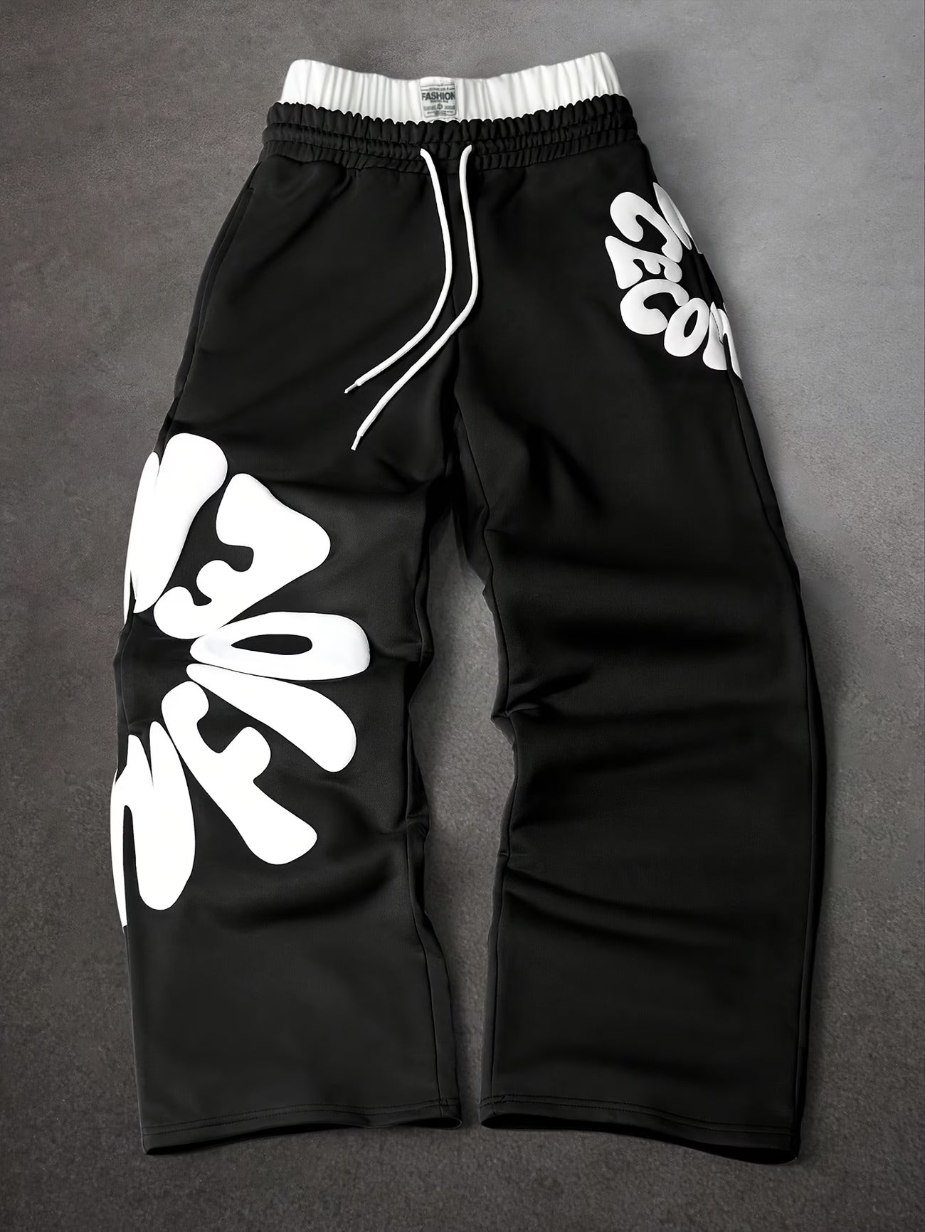 Loose-fitting sweatpants with letter print and drawstring waist